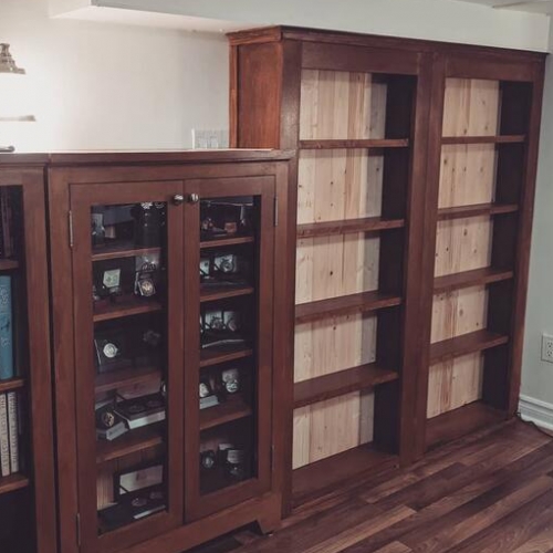 Bibliothèque avec porte caché 